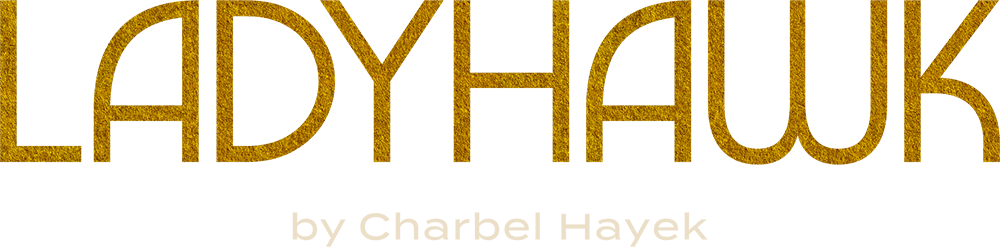 Lady Hawk by Charbel Hayek logo with gold lettering