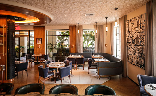 Ladyhawk Bar with seating at Kimpton la peer hotel